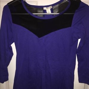 Purple shirt with black mesh sections